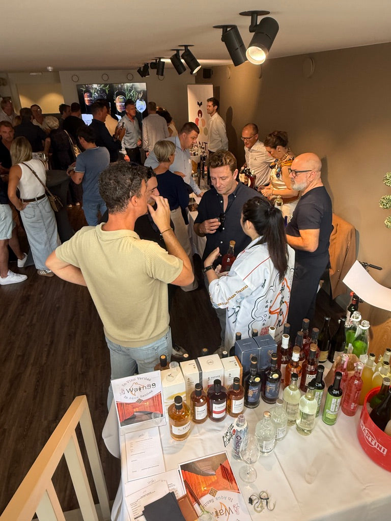 Guests meeting and discovering products at a WAIN99 event